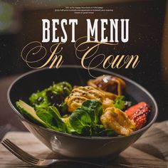 a bowl filled with vegetables on top of a wooden table