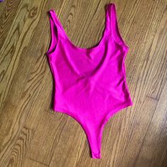 Hot Pink Bodysuit, Size Small, Super Stretchy, Low Back, Never Worn/Like New, Purchased From Jade Sky Pink Stretch Bodysuit With Lined Body, Sleeveless Pink Lined Bodysuit, Pink Fitted Swimwear With Scoop Neck, Pink Fitted Scoop Neck Swimwear, Fitted Pink Scoop Neck Swimwear, Pink Fitted Bodysuit With Scoop Neck, Pink Fitted Scoop Neck Bodysuit, Pink Stretch Scoop Neck Swimwear, Summer Pink Bodysuit With Scoop Neck