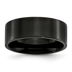 a black wedding ring on a white background