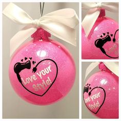 pink ornament with white ribbon hanging from it's side and the words love your step painted on it