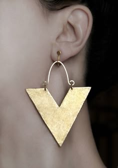 Just in: Big abstract earrings Clip on dangles Statement jewelry African screw back earring Gold large Dangling jewelry Triangle earrings Modern gift https://www.etsy.com/listing/542773765/big-abstract-earrings-clip-on-dangles?utm_campaign=crowdfire&utm_content=crowdfire&utm_medium=social&utm_source=pinterest Handmade Geometric Gold Earrings, Triangle Gold Metal Earrings, Gold Triangle Metal Earrings, Triangle Single Earring As Gift, Triangle Shaped Single Earring As A Gift, Gold Triangle Metal Jewelry, Unique Gold Dangle Clip-on Earrings, Gold Triangle Jewelry With Ear Wire, Nickel-free Gold Triangle Jewelry