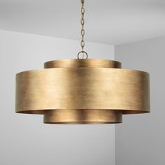 a light fixture hanging from a ceiling in a room