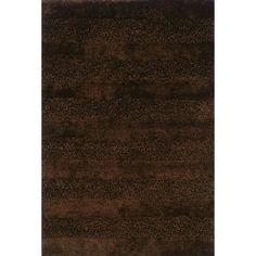 an area rug with brown tones