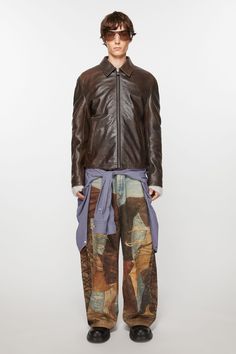 <div>Zipper jacket is cut to a regular fit and hip length. Crafted from nappa leather with a painted finish , detailed with an Acne Studios trademark logo on the lower back sleeve.</div> Trademark Logo, Studio Logo, Cuff Detail, Brown Leather Jacket, Zipper Jacket, Lower Back, Nappa Leather, Hip Length, Acne Studios