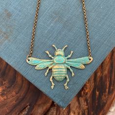 Oxidized brass bee pendant made from vintage tooling. Hung from 16 inches of antiqued brass chain finished with a lobster claw clasp. The bee measures 2 1\\/4" by about 1 1\\/4". Also available in antiqued silver and patina. Each purchase comes in a gift box. Dragonfly Insect, Bee Jewelry, Dragonfly Necklace, Bee Pendant, Vintage Style Jewellery, The Bee, Brass Chain, Style Jewelry, Teacher Appreciation