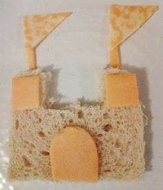 a piece of bread with slices of cheese on it