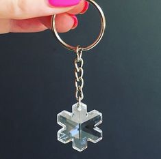 "https://www.tresajewelry.etsy.com Swarovski Crystal Snowflake Keychain in Clear Crystal Beautiful Swarovski crystal faceted snowflake keychain. Keep your keys looking cool with this sparkly snowflake. It's not only a keychain but can be used as a fabulous purse charm! Add a little sparkle to your keys, purse, or a zipper on a jacket for an easy yet sparkly zip. Specifications: --Swarovski crystal snowflake is 25mm in size, approximately 1\" in diameter.  --Key ring is 1\" in diameter and chain Snowflake Keychain, Love Keychain, Crystal Keychain, Silver Link Chain, Crystal Snowflakes, Gold Link Chain, Heart Keychain, Antique Pink, Purse Charms