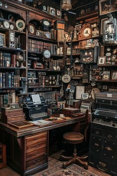 an old fashioned desk with lots of clocks on the wall and shelves full of books