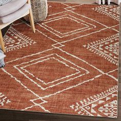 a brown and white rug in a living room