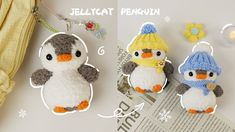 two stuffed penguins are sitting next to each other with hats on their heads and one penguin is wearing a knitted hat