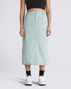 Made to move, the Riley Parachute Cargo Skirt is a roomy skirt with a fitted waist, cargo pockets with flap closures, and stylish bungee details with a drawstring hem. 100% Nylon fabric Cargo pocket with flap closure Bungee details | Vans Riley Parachute Cargo Skirt Womens Large Parachute Cargo, Cargo Skirt, Cargo Pocket, Nylon Fabric, Womens Skirt, Skirt, Clothes For Women, Fabric, Clothes