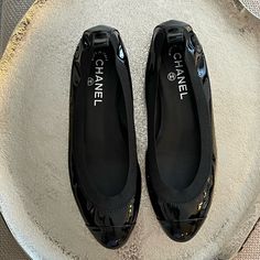 Vintageblack Patent Leather Ballet Flats With Interlocking Cc Logo. In Great Used Condition With Many More Miles To Be Walked In. I Would Say They Are A True Us 9, Maybe A Large 8.5. Zoom In On The Pictures As They Are Part Of The Description. As Is Condition, Shoes Only. Any Questions Just Ask. Luxury Black Flats With Removable Insole, Black Patent Leather Round-toe Flats, Black Patent Leather Round Toe Flats, Black Patent Leather Flats With Round Toe, Luxury Black Flats With Almond Toe, Designer Black Pointed Toe Flats, Luxury Black Almond Toe Flats, Designer Black Flats With Leather Sole, Black Patent Leather Closed Toe Flats