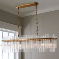 a chandelier hanging from a ceiling in a room