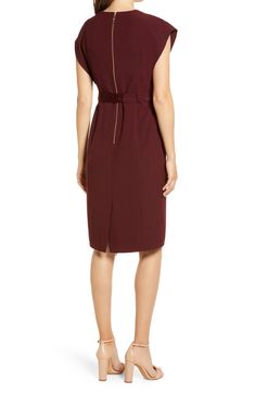 Create a long, lean silhouette with the help of flattering seams and a fitted waistline on this ruffle-sleeve sheath ideal for work or play. 41" length (size 8); 38 1/2" length (size 8P) Exposed back-zip closure V-neck Split flutter sleeves Ties at waist Side-seam pockets Back vent Lined 97% polyester, 3% spandex Dry clean or hand wash, dry flat Imported Dresses Fitted Belted Dress For Workwear In Fall, Fitted Belted Dress For Work In Fall, Fitted Belted Dress For Fall Workwear, Fall Workwear Fitted Belted Dress, Knee-length Belted Dress For Workwear In Fall, Career Sheath Dresses For Fall, Belted Knee-length Dress For Work, Fitted Burgundy Dress For Work, Belted Brown Dress For Work