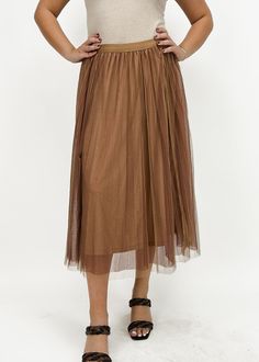 Capture the ideal fall look by styling this camel pleated mini skirt. This mesh skirt pairs perfectly with a graphic tee for an edgy look or a blazer for a more dressy look. Mesh Skirt, Edgy Look, Pleated Midi Skirt, Love Is Free, Pleated Mini Skirt, Fall Looks, Sweaters & Cardigans, Mini Skirt, Midi Skirt