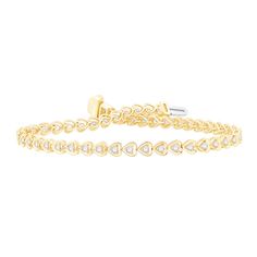 Express your feelings with this charming diamond heart line bracelet. 10K gold Bracelet features heart-shaped links, each centered with a single shimmering diamond 1 ct. t.w. of diamonds 7.25-inch bracelet; lobster claw clasp Gold Heart Cut Tennis Bracelet For Anniversary, Gold Diamond Heart Cut Bracelet, Luxury Yellow Gold Diamond Heart Bracelet, Heart-shaped Yellow Gold Diamond Bracelet, Gold Heart-shaped Diamond Bracelet With Accents, Heart-shaped Yellow Gold Cubic Zirconia Bracelets, Luxury Yellow Gold Heart-shaped Bracelet, Heart Line, Express Your Feelings