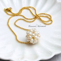 Beautiful and classic Freshwater pearl ball strung through 18" gold plated ball chain  Perfect for a bride, bridesmaid, flower girl, for special occasions or as a gift!!  Diameter of the freshwater pearl ball measures approx. 2cm (3/4 inch)  Comes in a gift box, ready for gift giving.  For more Jewelry designs from Treasured Adornment: http://www.treasuredadornment.etsy.com  Find Treasured Adornment on FACEBOOK, get latest news/designs, FREE GIVEAWAY and get discount Coupon Code!  http://www.facebook.com/TreasuredAdornment  For domestic (U.S.) customers: Ships via USPS First Class mail with delivery confirmation after the payment has been received and the production is complete. You will receive a notice with the tracking number once the item ships.  International customers: Your items wil Bridal Pearl Pendant Necklace Gift, Pearl Pendant Bridal Necklace Gift, Pearl Pendant Bridal Necklace As A Gift, Gold Bridal Necklace With Pearl Drop As Gift, Elegant Ball Chain Necklace As Gift, Bridal Necklace With Pearl Pendant As Gift, Elegant Ball Chain Necklace For Gift, Delicate Chain Pearl Necklace With Round Beads For Gift, Bridal Pearl Pendant Necklace With Round Beads