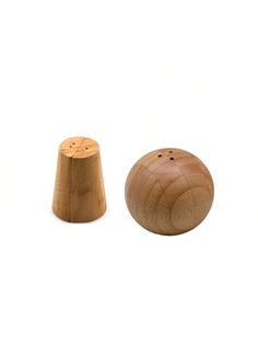 two wooden knobs sitting next to each other