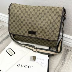 This Is The Perfect Messenger Bag For All Of Your Everyday Essentials! 100% Authentic. 14” L X 12” H X 4”D. Gucci Gg Monogram Coated Canvas. Adjustable Green And Cream Striped Strap. Versatile. Wear As A Shoulder Or Crossbody Bag. Gold Tone Hardware. Dark Brown Leather Trim. Flap With Snap Closure. Interior Is Brown Fabric With Zipper Pocket And 2 Patch Pockets. Made In Italy. New, Never Used With Original Retail Tag Attached. Comes With Gucci Box, Dust Bag, Retail Tag, Fabric Swatch And Care Bo Gucci Canvas Camera Bag, Gucci Green Satchel Bag, Gucci Green Shoulder Bag For Daily Use, Green Gucci Shoulder Bag For Daily Use, Daily Use Green Gucci Shoulder Bag, Designer Gucci Shoulder Bag For Business, Gucci Designer Shoulder Bag For Business, Classic Gucci Shoulder Bag With Logo, Rectangular Travel Shoulder Bag With Designer Logo