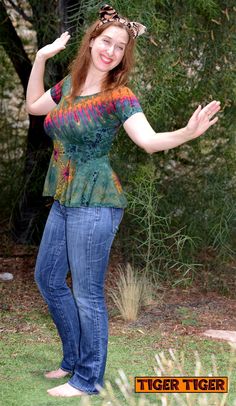 A fun and lively top that works well at a festival, but can also add color in an office environment! We have these beautiful Tops! Hand dyed and extremely bright and bold! Spandex Rayon Mix, extremely soft and comfortable! We have other designs and sizes available in the shop homepage! Available in Blues, Greens, Purples and Rainbow. Wash in cold water dry low! Fitted Tie Dye Hippie Tops, Fitted Hippie Tie Dye Tops, Fitted Bohemian Acid Wash Tops, Acid Wash Fitted Top For Festival, Fitted Acid Wash Tops For Festival, Fitted Acid Wash Hand Dyed Top, Acid Wash Fitted Hand Dyed Top, Fitted Multicolor Hand Dyed Tops, Tie Dye Jumpsuit