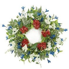 a wreath with red, white and blue flowers on the front is displayed against a white background