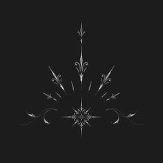 a black and white photo of a snowflake