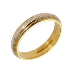 a gold wedding ring with two rows of white and yellow gold inlays on it