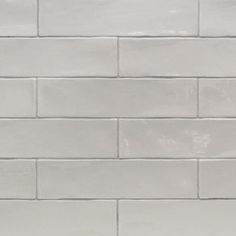 a white brick wall with no mortars on it