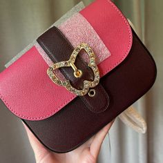 Crossgrain Leather Inside Zip Pocket Snap Closure, Fabric Lining Outside Open Pocket Chain Strap With 23 1/2" Drop For Shoulder Or Crossbody Wear 7" (L) X 5 1/2" (H) X 2 1/4" (W) Style No. C6797 Elegant Pink Shoulder Bag With Magnetic Closure, Chic Coach Shoulder Bag Gift, Coach Bags Perfect As Gifts, Coach Bags Perfect For Gifts, Chic Coach Shoulder Bag As Gift, Chic Coach Shoulder Bag For Gift, Coach Bag For Gift, Elegant Coach Shoulder Bag For Party, Pocket Chain