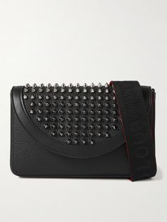 You can always count on Christian Louboutin to give your outfit a shot of punk glamour. Detailed with signature silver-tone spikes and debossed logos along the sides, this 'Explorafunk' messenger bag has been crafted in Italy from durable full-grain leather and fitted with six internal slots and a zipped pocket, so it'll double as a wallet. Studded Leather Party Bag, Leather Party Bag With Studs, Formal Leather Bags With Studs, Designer Evening Bags With Rivets, Luxury Shoulder Bag With Rivets, Designer Leather Shoulder Bag With Studs, Designer Black Bag With Studs, Luxury Evening Shoulder Bag With Rivets, Designer Black Bags With Studs