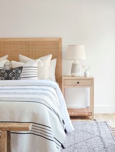 Styled front view of Rattan Headboard with Oak + Leather Strap Side Table. - Saffron and Poe Bedroom Inspo Neutral, White Oak Side Table, California Casual Style, Style Californien, Interior Design Contemporary, Bedroom Contemporary, Hand Carved Teak, Rattan Headboard, Mid Century Aesthetic