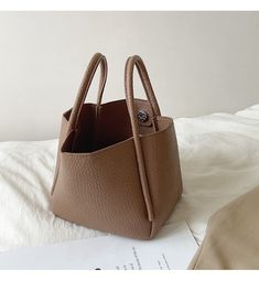 2022 Fall New style Material: High Quality Soft PU Leather Size: 12cm bottom length x 15cm tall (5in x 6in) Designer Style ID: 8376 Soft Leather Bucket Bag with Shoulder Strap and Inner Pouch Solid Phone Bag With Large Capacity For Daily Use, Brown Leather Phone Bag With Large Capacity, Solid Leather Large Capacity Phone Bag, Trendy Square Pouch For Daily Use, Large Capacity Leather Phone Bag, Brown Large Capacity Phone Bag For Office, Trendy Leather Pouch With Large Capacity, Solid Color Leather Rectangular Phone Bag, Square Leather Phone Bag For Office