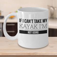 a white coffee mug with the words if i can't take my kayak i'm not going