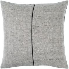 a grey pillow with black piping on the front and side, sitting against a white background