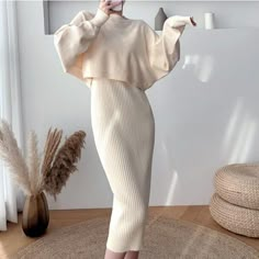 Brand Name: SMTHMAFabric Type: Knitted FabricStyle: SweetMaterial: AcrylicOrigin: CN(Origin)CN: GuangdongSeason: WinterFabric content: 31% (inclusive) - 50% (inclusive)Decoration: AppliquesCollar: O-NeckClosure Type: PulloverSleeve Style: Batwing SleeveMaterial Composition: Synthetic fiberPattern Type: SolidGender: WOMENSilhouette: A-LINEPant Closure Type: Elastic WaistSleeve Length(cm): FullDresses Length: Mid-CalfAge: Ages 18-35 Years OldRelease Date: Winter 2021Clothing Patterns: Cape typeClo Job Outfits, Women Loose Shirt, Dress Sets, Womens Dress Suits, Leisure Fashion, Bat Sleeve, Knitted Vest, Church Outfits, Sweater Dress Midi