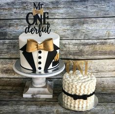 a cake that is sitting on top of a table next to a plate with the word mr onederfit written on it