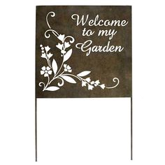 a black and white sign that says welcome to my garden on it's side