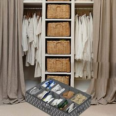 an organized closet with clothes, shoes and linens in baskets on the bottom shelf