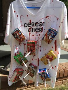 a t - shirt that has been decorated with candy bars and creat killer on it