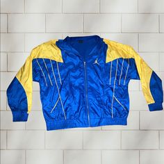 Vintage 90s Jordan Track Jacket Awesome Condition Zip Up Blue And Yellow Super Rare Xxl Fits Xl 90s Style Yellow Windbreaker For Streetwear, Vintage Yellow Long Sleeve Windbreaker, Yellow Vintage Long Sleeve Windbreaker, Retro Yellow Windbreaker For Streetwear, Yellow Retro Windbreaker For Streetwear, Yellow 90s Windbreaker For Winter, 90s Yellow Windbreaker For Winter, 90s Yellow Outerwear For Streetwear, 90s Yellow Streetwear Outerwear