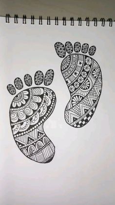 a drawing of two feet with patterns on them