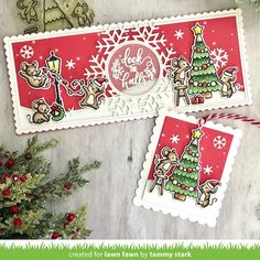 two handmade christmas cards on a table