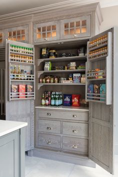 an organized pantry with lots of food and drinks