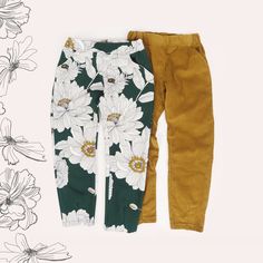 two pants with white flowers on them next to a flowery wallpaper pattern and the bottom one has brown cord