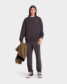 Constructed of 100% USA grown cotton, our sweatpants are pre-shrunk and fit slightly oversized. Our sweatpants are made in Los Angeles where our factory pays its employees above minimum wage + overtime and benefits. - 100% Cotton, 11.5 oz- Made in the USA- Embroidered logo- Elastic Waistband with Drawstring- Shrink Free- Garment Dyed- Unisex Serif Logo, Iphone Case Collection, Box Pleat Skirt, Minimum Wage, Sweatpants Shorts, Sporty And Rich, Short Shirts, Boxer Shorts, Quilted Jacket