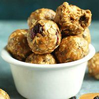 a white bowl filled with oatmeal energy bites