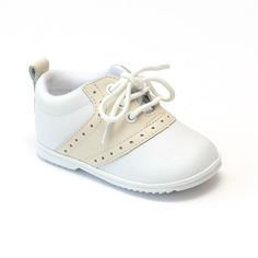 This two tone white/beige leather saddle oxford is designed for your active little one. Great shoe for dressing up with no fuss. Perfect for little gents or little ladies. Leather upper Lace up front with perforated trim Rubber outsole Pull tab at collar Note: Sizes 1-7 (Baby 1 to Toddler 7) Size Chart (in-sole length, measured from inside): Size 1 2 3 4 5 6 7 Inches 4.25 4.56 4.86 5.25 5.44 5.81 6.13 Angel Baby Shoes, White Oxford Shoes, Best Baby Shoes, Saddle Oxfords, Boys Fashion Trends, Shoes For School, Narrow Shoes, Saddle Shoes