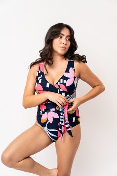 Blue Floral Wrap Front One Piece | JQ Clothing Co. Fitted Swimwear With Wrap-around Straps For Summer, V-neck Swimwear With Tie Waist For Summer, V-neck Tie Back Beachwear Swimwear, Summer Swimwear With Wrap-around Straps For Vacation, Summer Pool Swimwear With Tied Details, Tied Swimwear For Pool In Summer, Sleeveless Swimwear With Wrap-around Straps For Vacation, Summer Tied Swimwear For Pool, Spring Summer Swimwear With Tie Waist