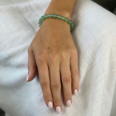 Wear this green aventurine bracelet to enjoy a symbol of good luck and fortune. It is believed in many ancient cultures such as Greek and Egypt that green aventurine represents wealth, prosperity, and success. This 8mm bracelet has excellent quality beads. It's a perfect piece of aventurine jewelry to wear every day.

 

 	Free Shipping 2 Days
 	Size: Adjustable, 8MM
 	Material: Authentic Stone, Green Aventurine
 	Color: Green
 	Style: Beaded Bracelet Adjustable Aventurine Beaded Bracelets, Elegant Aventurine Beaded Bracelets For Healing, Green Jade Crystal Bracelet For Meditation, Adjustable Green Aventurine Crystal Bracelet, Green Jade Beaded Bracelets For Meditation, Green Amazonite Jewelry With 8mm Beads, Green Amazonite Bracelet With 8mm Beads, Green Aventurine Crystal Bracelet With Natural Stones, Green Aventurine Stretch Bracelet With Natural Stones