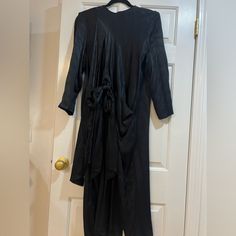 Never Worn! Amazing Dress With Front Pockets And Can Tie Bows Or Leave As More Draped Panels, Silver Zipper In Back. Perfect For Work Or Formal Event! Black Long Sleeve Maxi Dress With Tie Waist, Black Long Sleeve Dress With Tie Waist, Black Long Sleeve Silk Dresses, Black Long Sleeve Viscose Midi Dress, Black Viscose Long Sleeve Midi Dress, Black Maxi Dress With Tie Waist For Work, Black Silk Midi Dress For Fall, Chic Black Maxi Dress With Tie Waist, Black Tie Waist Evening Dress